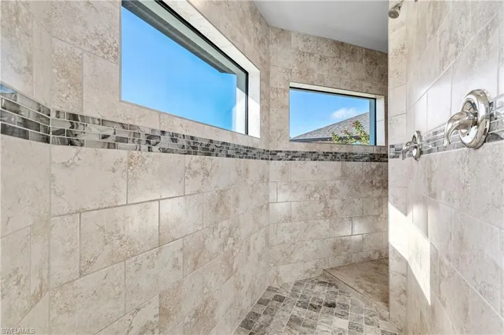 Full bathroom with a walk in shower