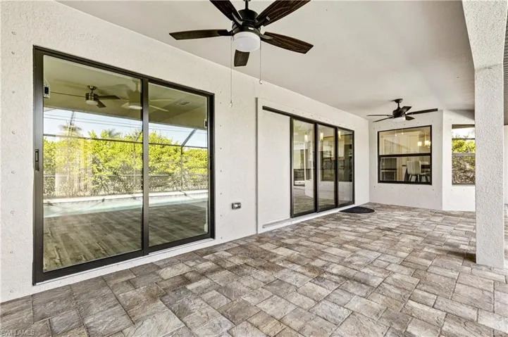 View of patio / terrace featuring a ceiling fan