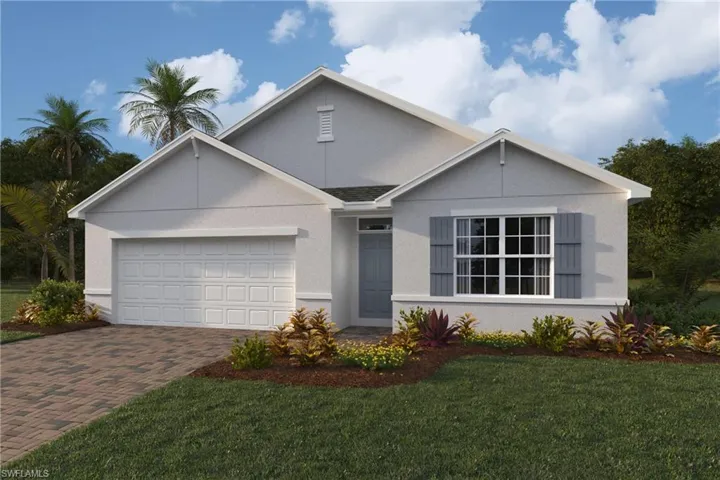 View of front of home featuring decorative driveway, an attached garage, a front yard, and stucco siding
