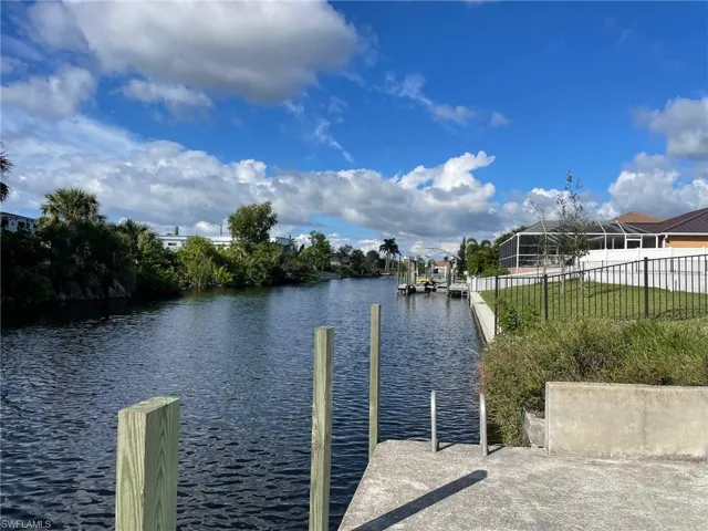 Dock featuring a water view
