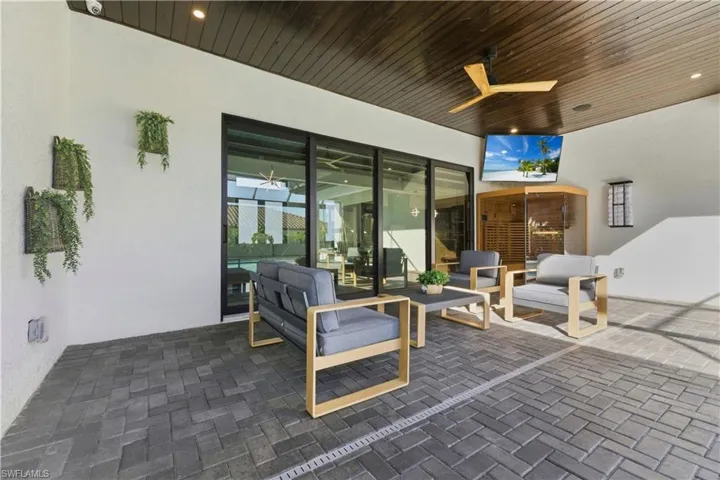 View of patio / terrace featuring ceiling fan and outdoor seating