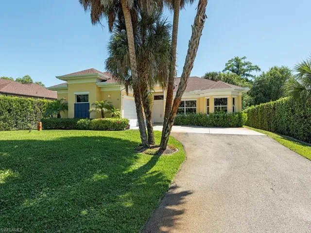 Front elevation including gated driveway