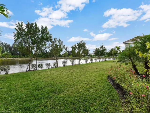 View of grassy yard featuring a water view