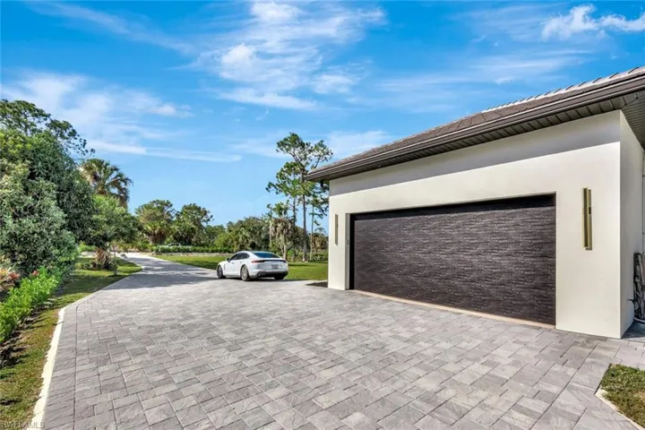 Garage with decorative driveway