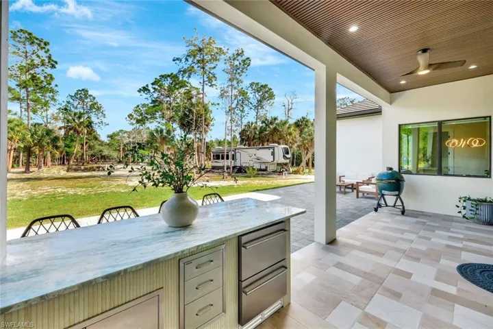 View of patio with area for grilling