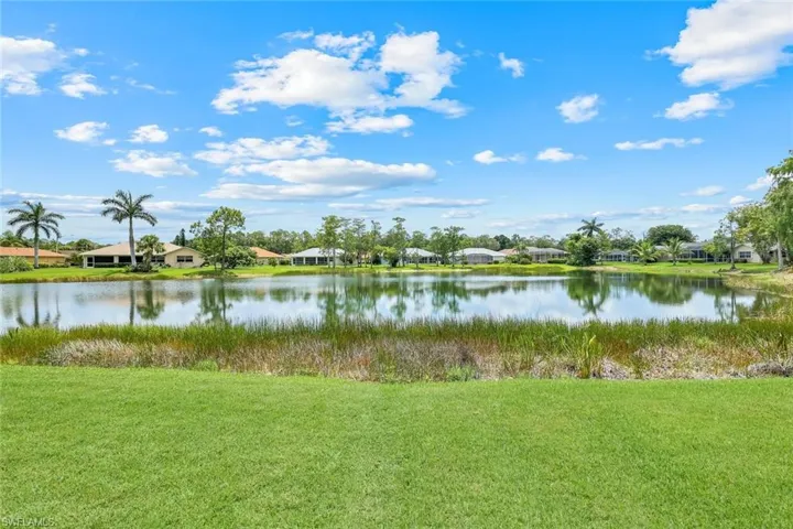 Water view with nearby suburban area