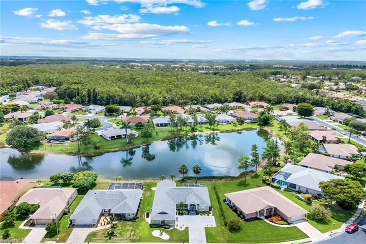 Aerial view of residential area with a nearby body of water