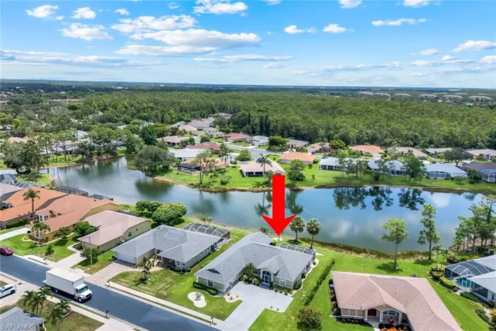 Aerial view of residential area with a large body of water