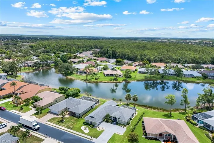 Aerial view of residential area with a large body of water