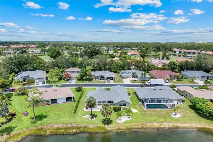 Aerial view of residential area with a nearby body of water