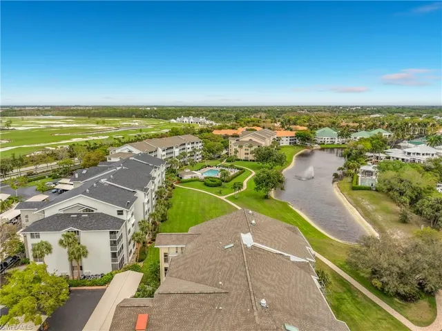 Aerial view of a golf club and a nearby body of water