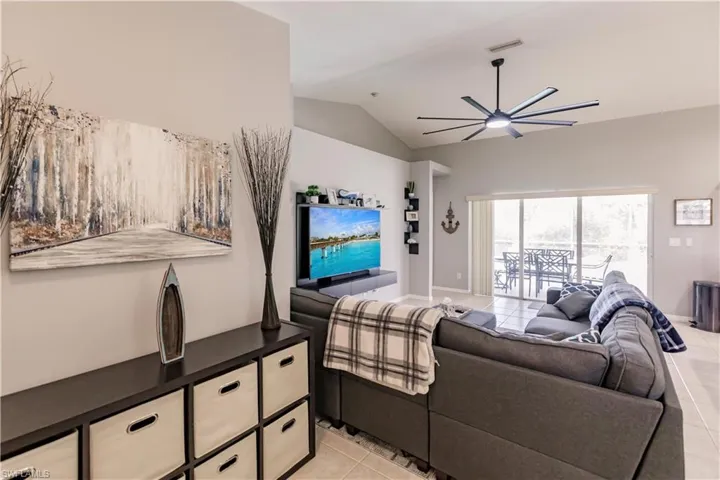 Tiled living room with ceiling fan