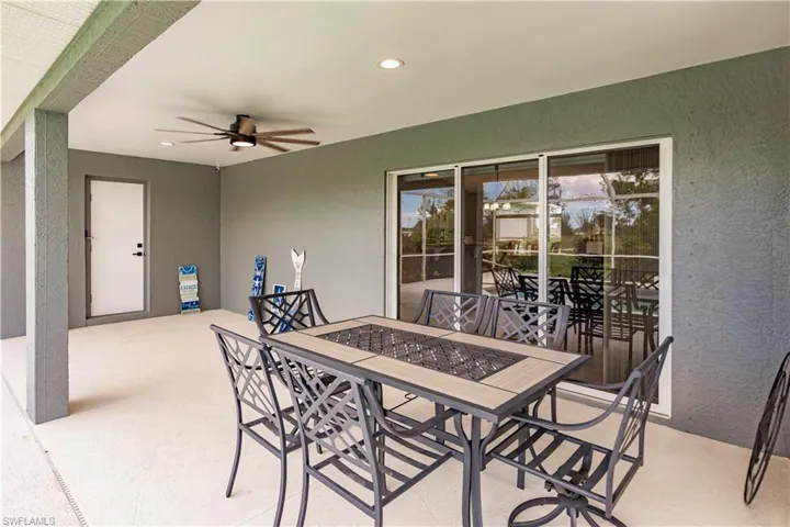 View of patio with ceiling fan