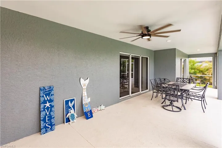 View of patio with ceiling fan
