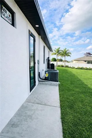 View of yard with a patio area-reel color grass
