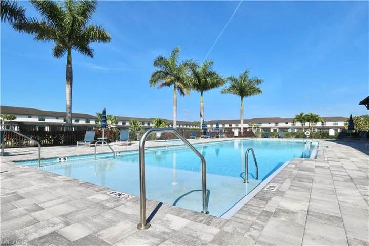 Community pool featuring a patio area