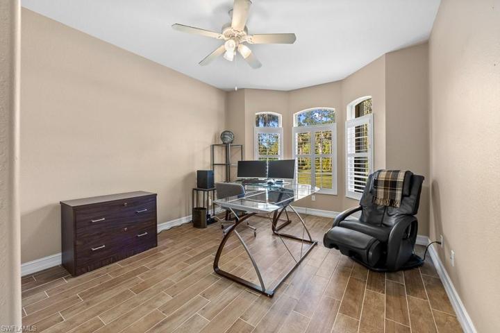 Guest bedroom with view of the front yard. Light and bright!