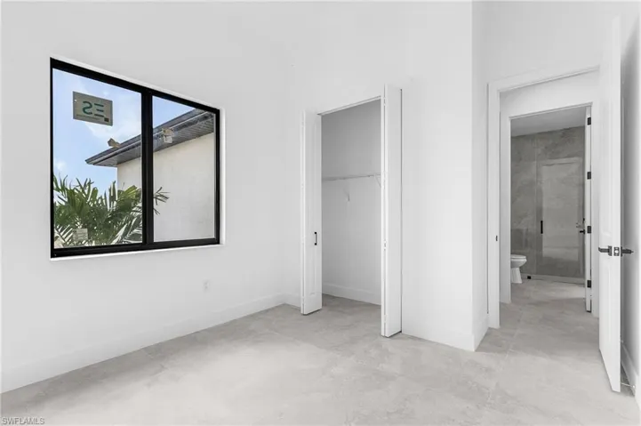 Unfurnished bedroom with a closet