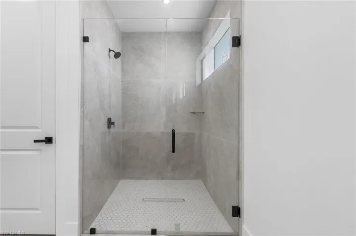 Bathroom featuring an enclosed shower