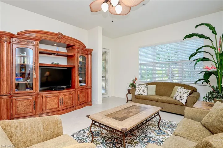 Stately entertainment center.  Can be opened wider to accomodate a bigger TV
