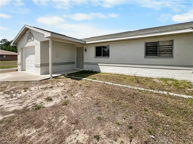 2704  Owen  AVE, Lehigh Acres, FL 33973