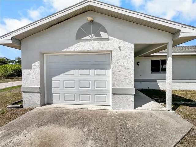2704  Owen  AVE, Lehigh Acres, FL 33973