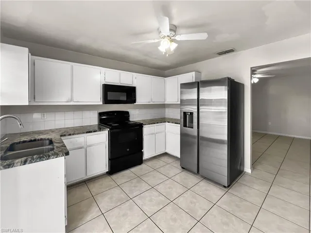 2704  Owen  AVE, Lehigh Acres, FL 33973