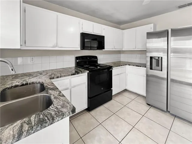 2704  Owen  AVE, Lehigh Acres, FL 33973