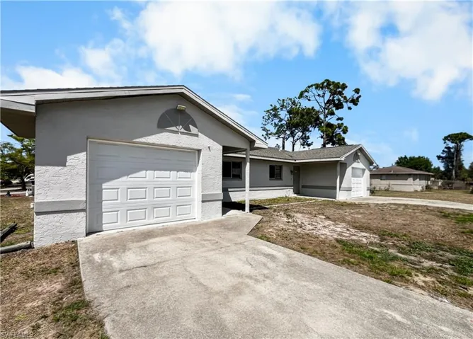 2704  Owen  AVE, Lehigh Acres, FL 33973
