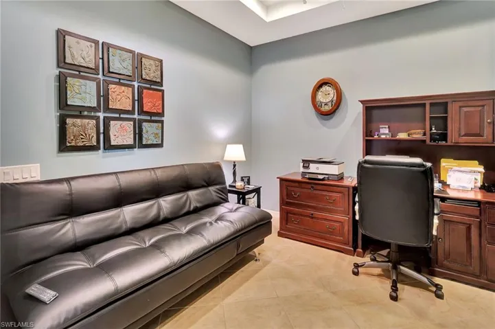 Office space with light tile patterned floors