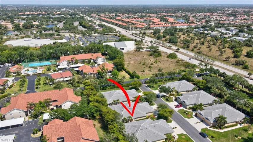 Birds eye view of property with a residential view