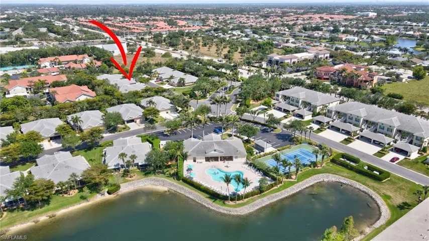 Bird's eye view with a water view and a residential view