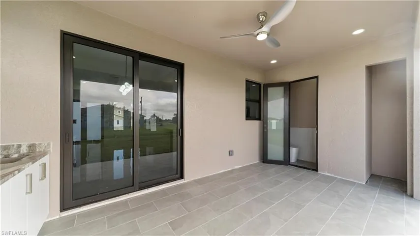 View of patio / terrace with ceiling fan