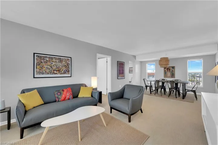 Living room with carpet and baseboards