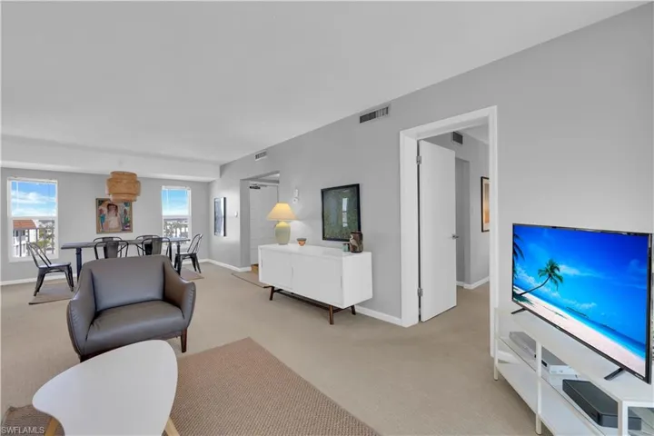 Living area with carpet flooring