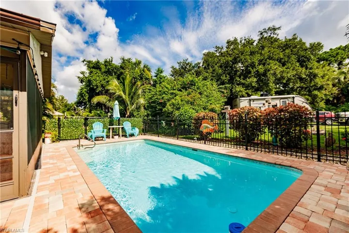 View of pool with a patio area