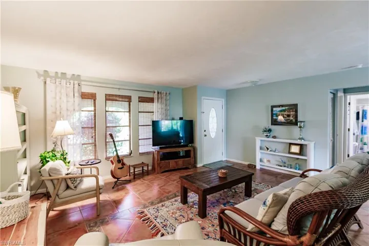 Living room with tile patterned floors