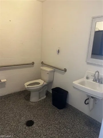 Bathroom featuring toilet and sink