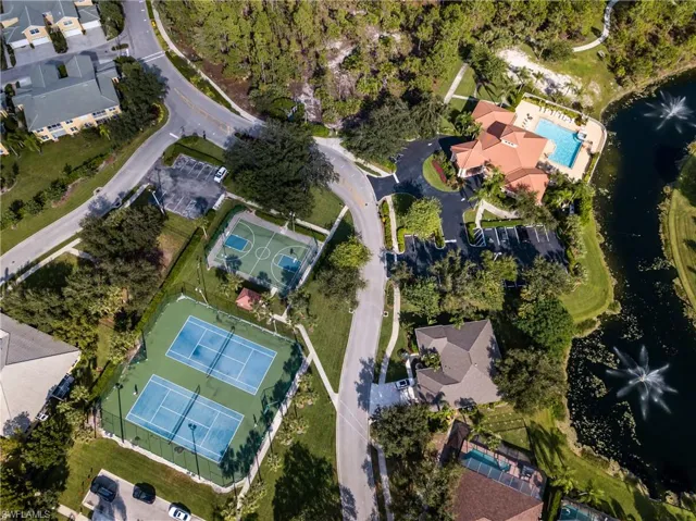 Fantastic amenities including a clubhouse with resort-style pool overlooking a lake, state-of-the-art fitness center, playground, basketball courts, tennis, pickleball & walking/biking trails meandering through scenic preserve.