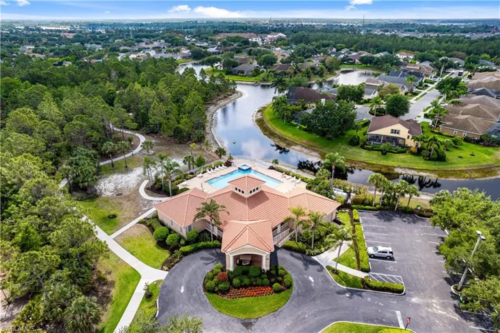 Fantastic amenities including a clubhouse with resort-style pool overlooking a lake, state-of-the-art fitness center, playground, basketball courts, tennis, pickleball & walking/biking trails meandering through scenic preserve.