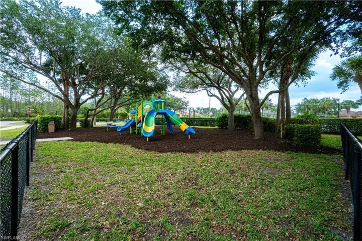 PlaygFantastic amenities including a clubhouse with resort-style pool overlooking a lake, state-of-the-art fitness center, playground, basketball courts, tennis, pickleball & walking/biking trails meandering through scenic preserve. round