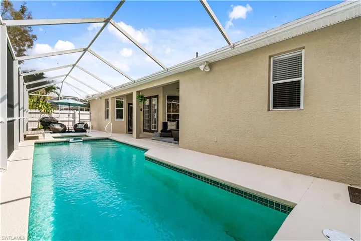 Spacious pool deck (refinished in 2025) with coveted Western exposure for prime sun!