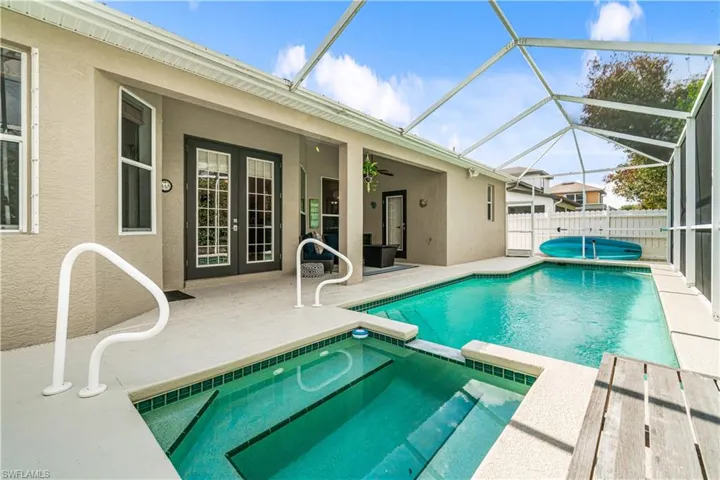 Spacious pool deck (refinished in 2025) with coveted Western exposure for prime sun!