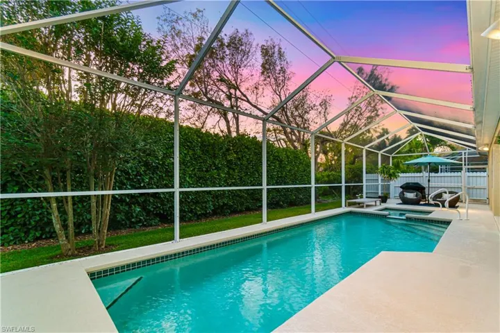 Spacious pool deck (refinished in 2025) with coveted Western exposure for prime sun!