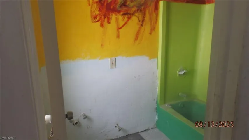 Bathroom featuring bathtub / shower combination