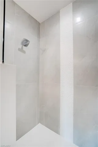 Bathroom with a tile shower