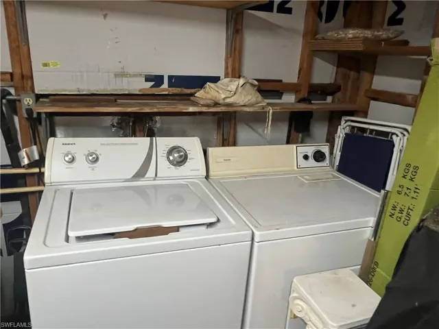 Washroom featuring separate washer and dryer