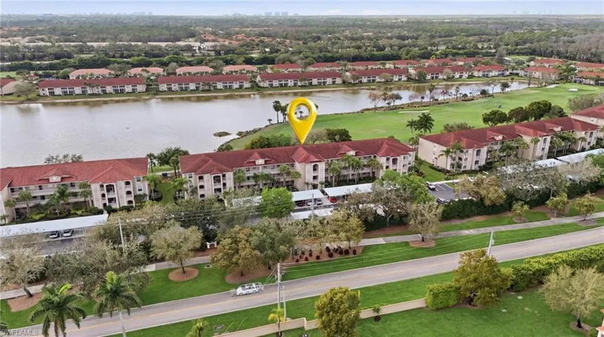 Aerial view of a golf course and a large body of water