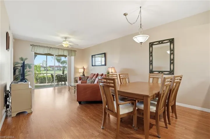 Dining space featuring light wood finished floors and ceiling fan