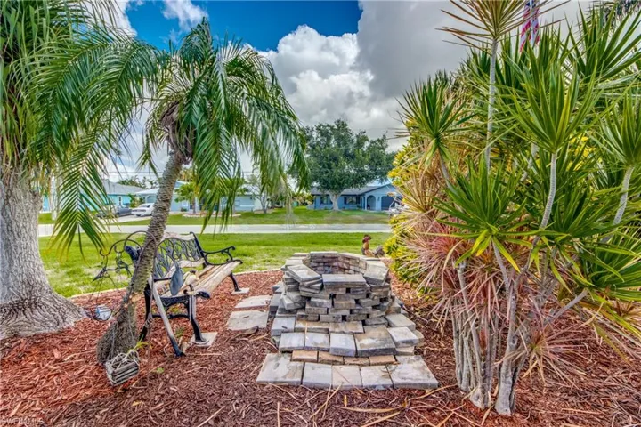 View of firepit in garden
